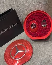 MERCEDES BENZ WOMAN IN RED 